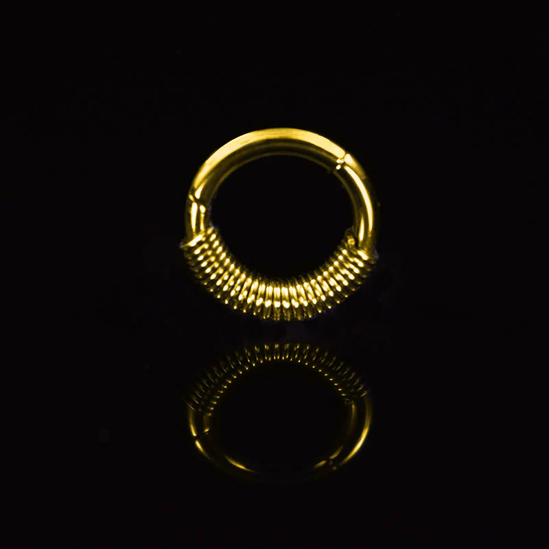 Small Hinged Segment Ring with Bali Coil in Gold PVD